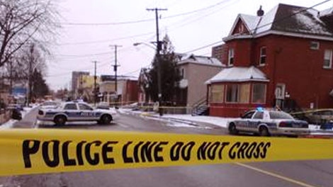 Ottawa police block off a section of Booth Street for a homicide investigation, Monday, Dec. 6, 2010.