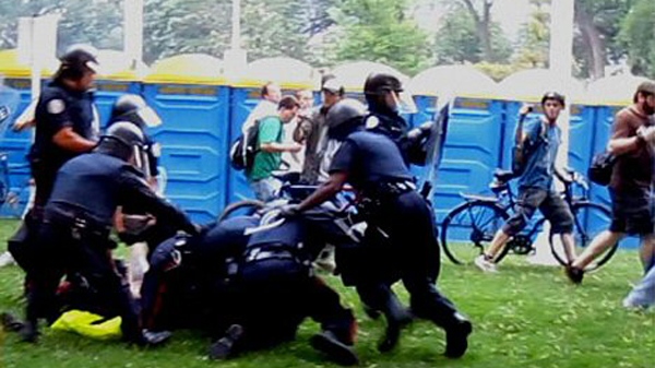Ontario's Special Investigations Unit is looking for witnesses to the arrest of Adam Nobody during the G20 Summit on June 26, 2010, as captured on video images released on Dec. 7, 2010.
