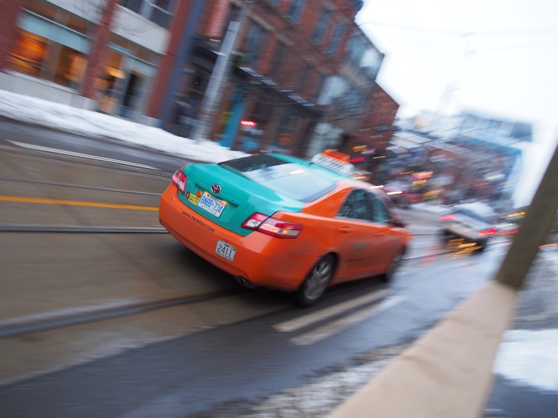 A Beck cab drives along King Street near Sherbourne Street on Friday Dec. 28, 2012. (Maurice Cacho / CTV News)
