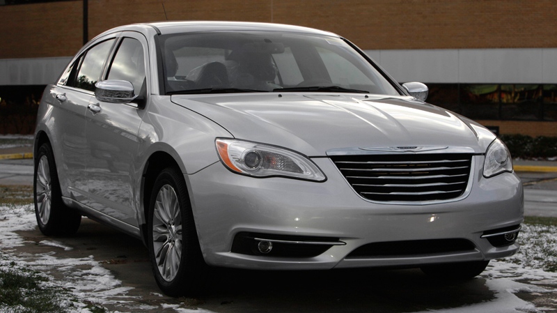 A 2011 Chrysler 200 is shown outside the Chrysler Sterling Heights Assembly plant in Sterling Heights, Mich., Monday, Dec. 6, 2010. (AP / Paul Sancya)