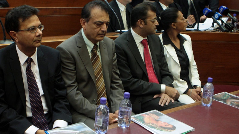 Father of murdered Swedish woman, Anni Dewani, Vinod Hindochain, second from left, in the High Court in Cape Town South Africa, Tuesday, Dec 7, 2010. (AP)
