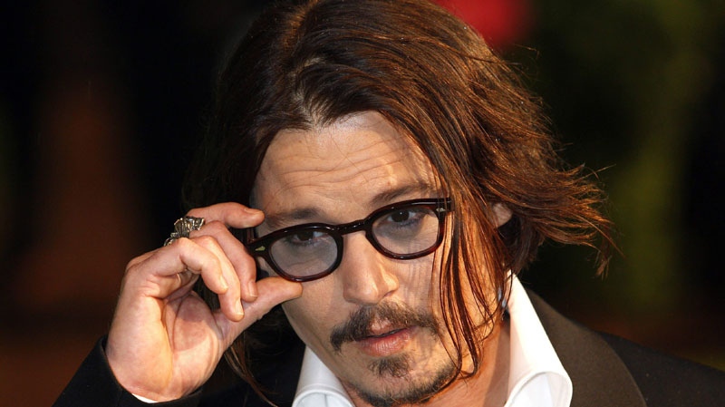 U.S. actor Johnny Depp arrives for the Royal World Premiere of the movie Alice in Wonderland in Leicester Square, London, Thursday, Feb. 25, 2010. (AP Photo/Kirsty Wigglesworth)