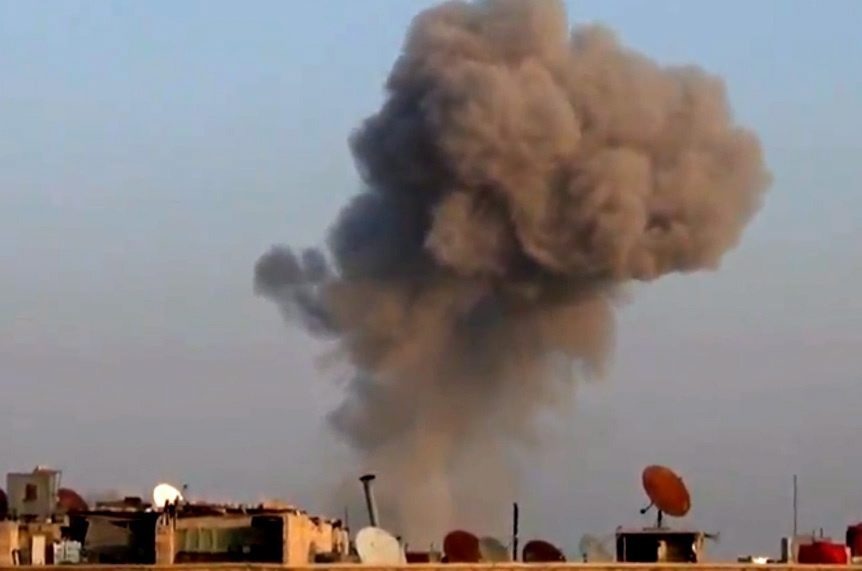 Smoke rises above Damascus