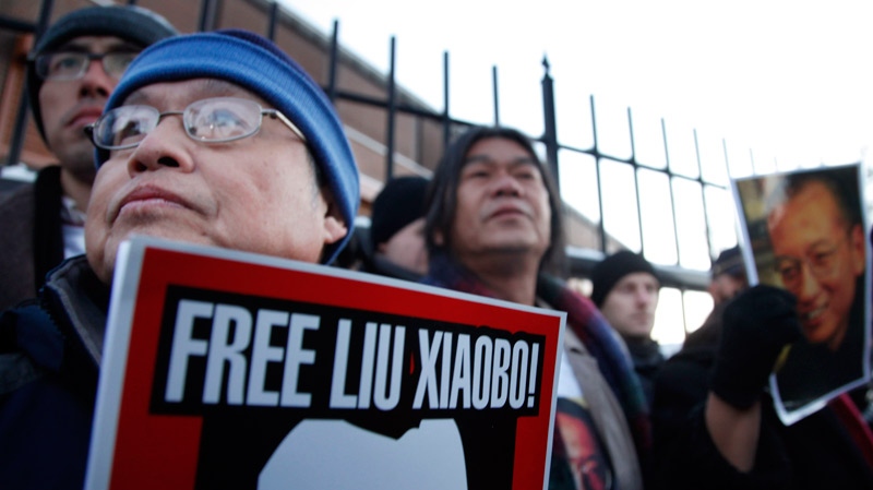 Protestors demand the freedom of Nobel peace laureate Liu Xiaobo Thursday Dec. 9, 2010 outside the Chinese Embassy in Oslo, Norway. (AP / John McConnico)