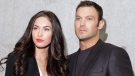Megan Fox poses with her husband Brian Austin Green after watching the presentation of the Emporio Armani Spring-Summer 2011 fashion collection, during the fashion week in Milan, Italy, Saturday, Sept. 25, 2010. (AP / Luca Bruno)