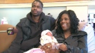 Proud mom Roxanne Henry and husband Kwasi Agyeman of Mississauga pose with newborn daughter Mya in hospital on Thursday, Dec. 9, 2010.