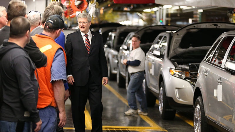 Prime Minister Stephen Harper greets autoworkers at Ford Motor plant in Oakville Ont. on Friday, Jan. 4, 2013. (Chris Young / THE CANADIAN PRESS)
