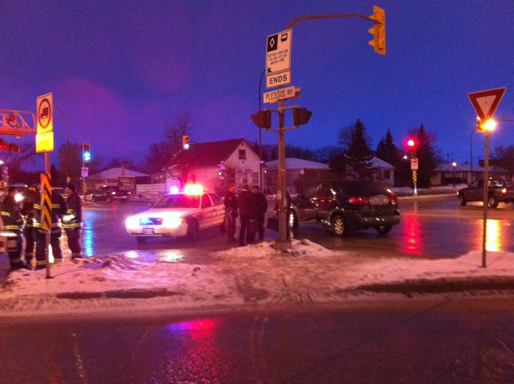 Crews clean up a crash at Plessis and Regent.