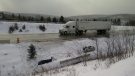 RCMP responded to a collision between two transport trucks early Monday. 