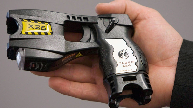 A police-issued Taser gun is displayed at the Victoria police station in Victoria, B.C. May 7, 2008. (Jonathan Hayward / THE CANADIAN PRESS)