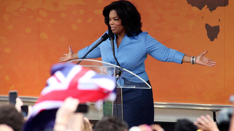 Oprah Winfrey gestures as she meets her fans in Melbourne, Australia, Friday, Dec. 10, 2010. (AP / David Crosling)