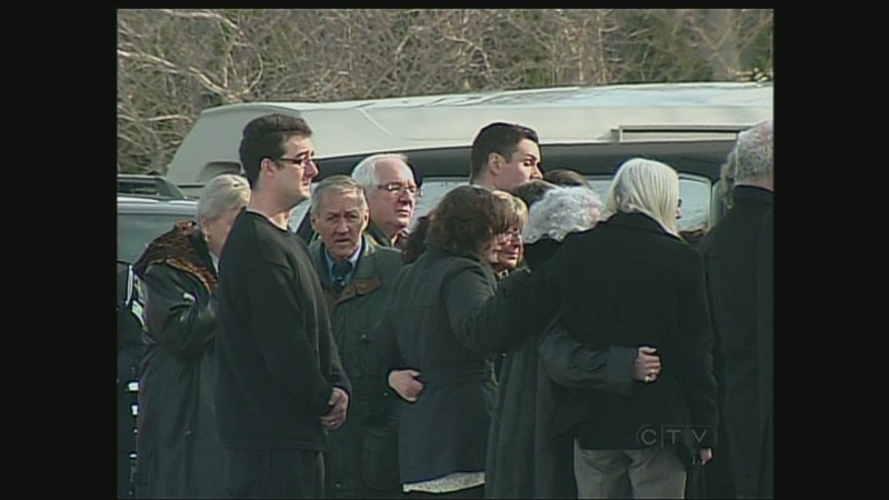 Mourners attend the funeral for 27-year-old Noelle Paquette in Brights Grove, Ont. on Tuesday, Jan. 8, 2013.