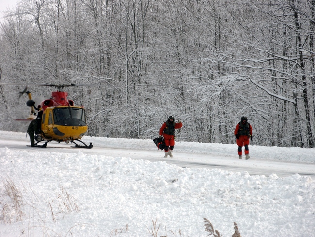 A Canadian Forces CH-146 Griffon helicopter lands to help stranded drivers on Highway 402 near Sarnia, Ont., Tuesday, Dec. 14, 2010. (Beth Campbell / MyNews.CTV.ca)