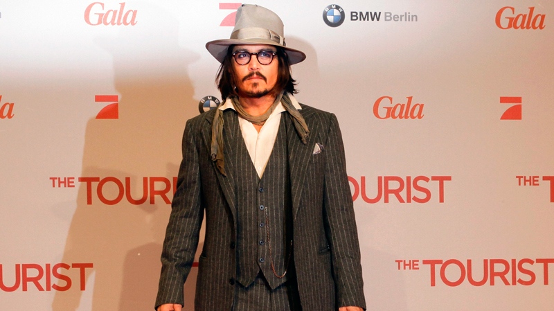 Johnny Depp arrives at the European premier of the movie 'The Tourist' in Berlin on Tuesday, Dec. 14, 2010. (AP / Markus Schreiber)