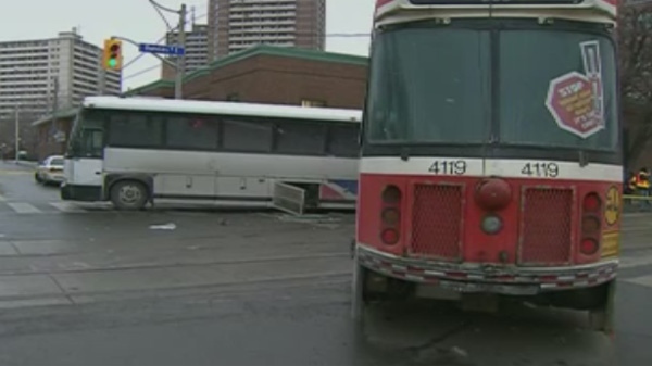 As many as six people were injured after a bus collided with a streetcar in downtown Toronto on Dec. 16, 2010.