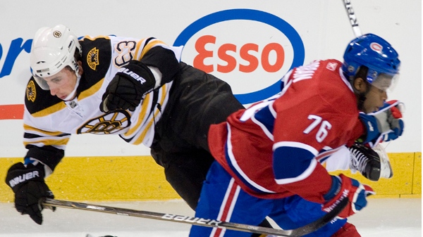 Montreal Canadiens' PK Subban, right, collides with Boston Bruins' Brad Marchand during first period NHL action in Montreal Thursday, December 16, 2010.THE CANADIAN PRESS/Graham Hughes