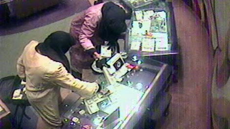 Suspects in the robbery of Ben Moss Jewellers at the Fairview Park Mall are seen in this image taken from security video.