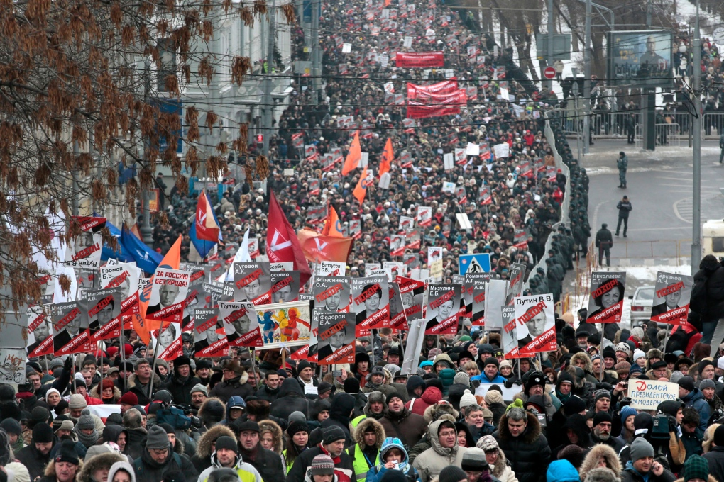 Thousands march in protest of Russia adoption bill