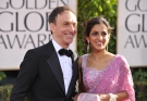 Mychael Danna, left, and Aparna Danna arrive at the 70th Annual Golden Globe Awards at the Beverly Hilton Hotel in Beverly Hills, Calif., Sunday Jan. 13, 2013. 