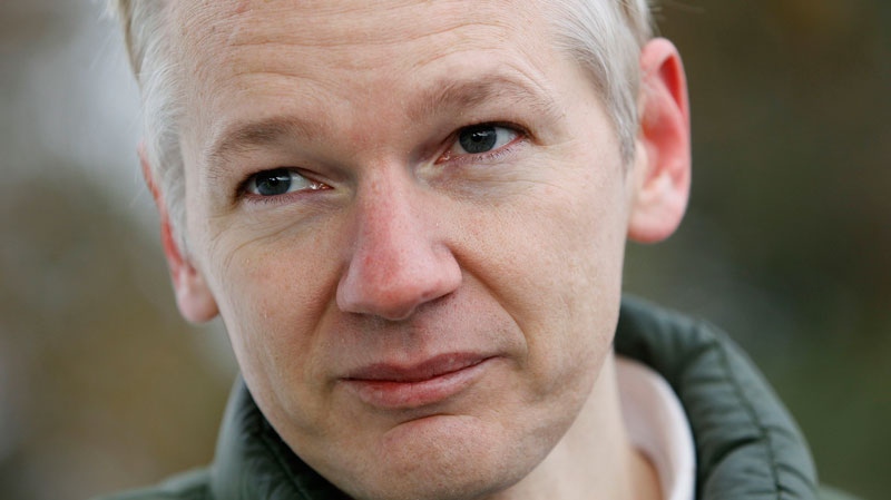 Julian Assange, the founder of WikiLeaks, faces the media in the grounds of Ellingham Hall, the home of Front Line Club founding member Vaughan Smith, at Bungay, England, Friday, Dec. 17, 2010. (AP / Kirsty Wigglesworth)