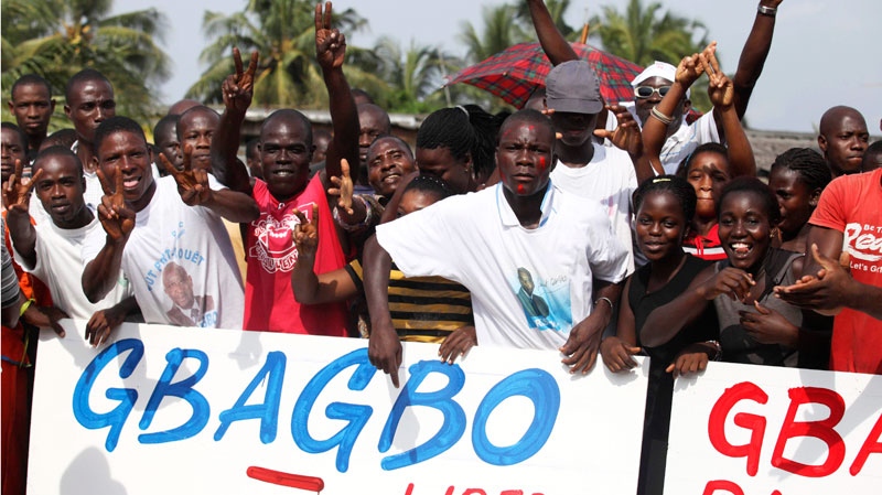 Supporters of President Laurent Gbagbo attend a youth rally in Ivory Coast, Abidjan, Sunday, Dec. 19, 2010. (AP / Sunday Alamba)