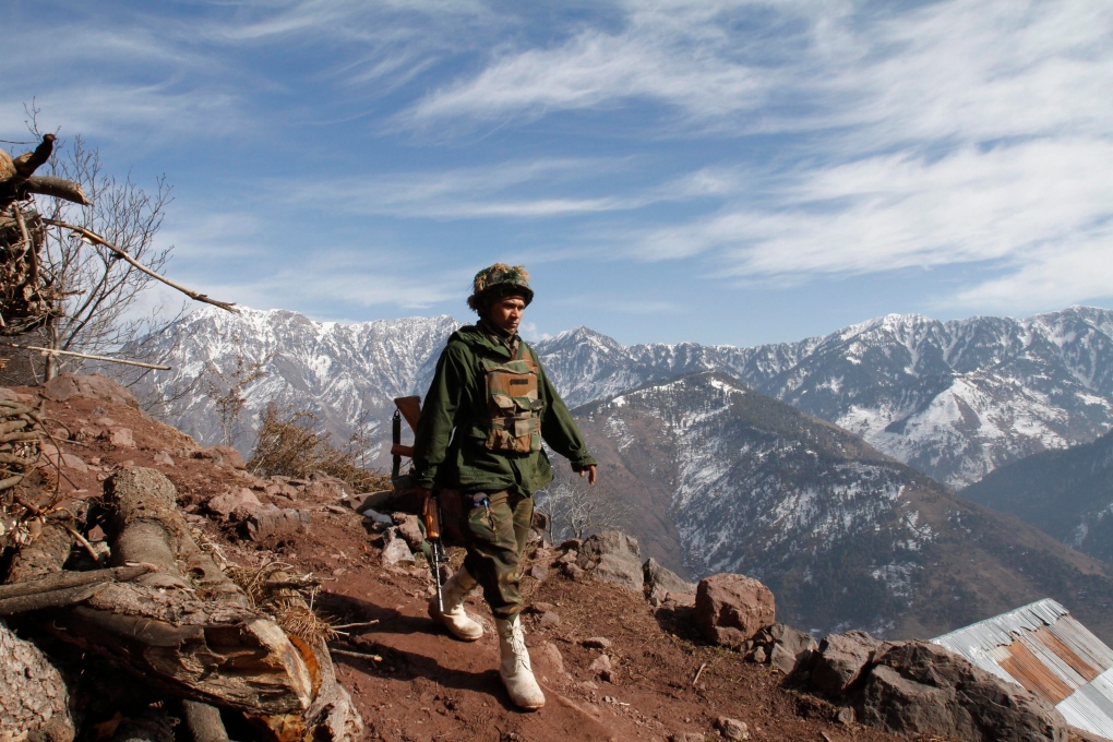 Indian army soldier patrols in Kashmir