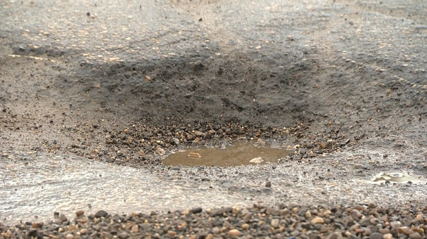 Unseasonable melt reveals potholes, bad year forecast for rough roads ...