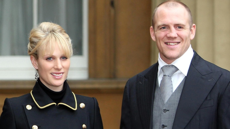 Zara Phillips and British rugby player Mike Tindall pose together outside Buckingham Palace in London, Wednesday, Nov. 28, 2007. (AP / Steve Parsons)