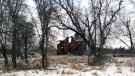 A fire destroyed an abandoned house west of Ottawa Wednesday,Dec. 22, 2010.