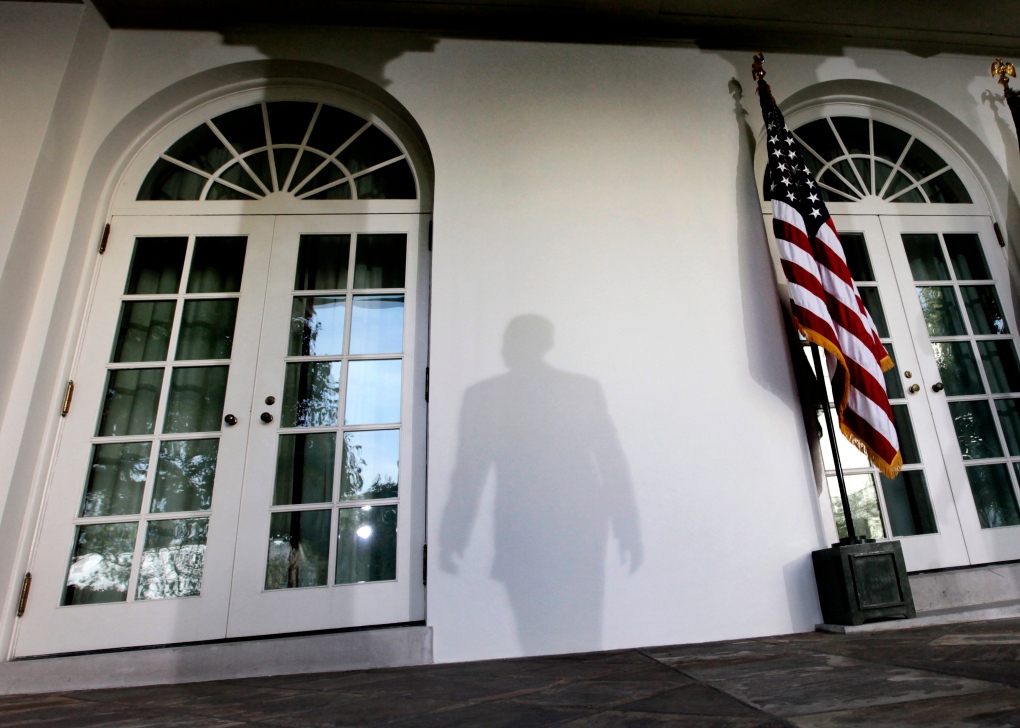 Barack Obama's shadow cast on Rose Garden wall