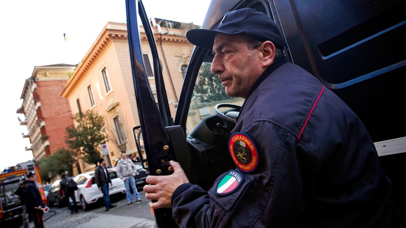 A Carabinieri bomb expert officer arrives at the Ukrainian embassy where a false bomb alarm was reported, in Rome, Thursday, Dec. 23, 2010. (AP / Angelo Carconi)