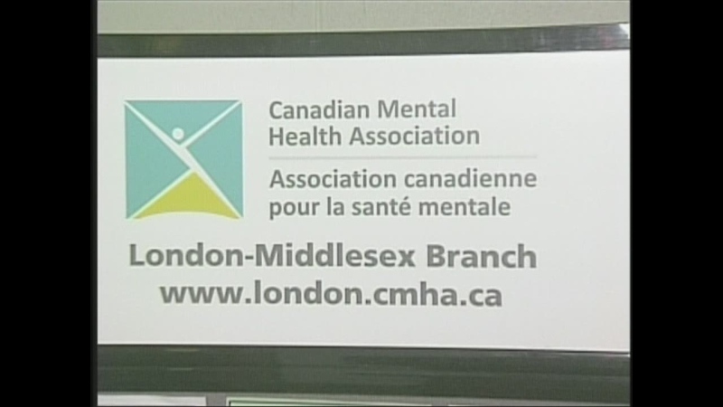 A banner for the Canadian Mental Health Association is seen at a 'Blue Monday' event at Fanshawe College in London, Ont. on Monday, Jan. 21, 2013.