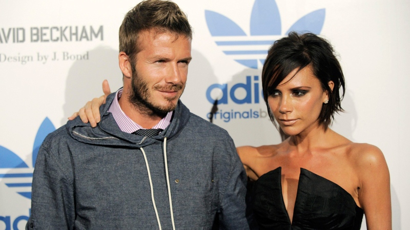 David Beckham and his wife Victoria arrive at an event to celebrate the launch of the Adidas Originals by Originals David Beckham clothing line designed by James Bond, Wednesday, Sept. 30, 2009, in Los Angeles. (AP / Chris Pizzello)
