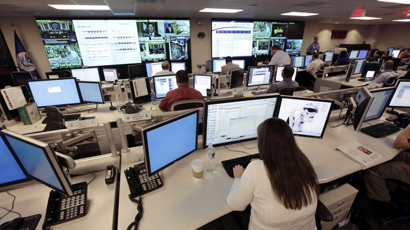 In this Sept. 24, 2010, photo the U.S. National Cybersecurity and Communications Integration Center (NCCIC) prepares for an exercise at its operations centre in Arlington, Va. (AP Photo / J. Scott Applewhite)