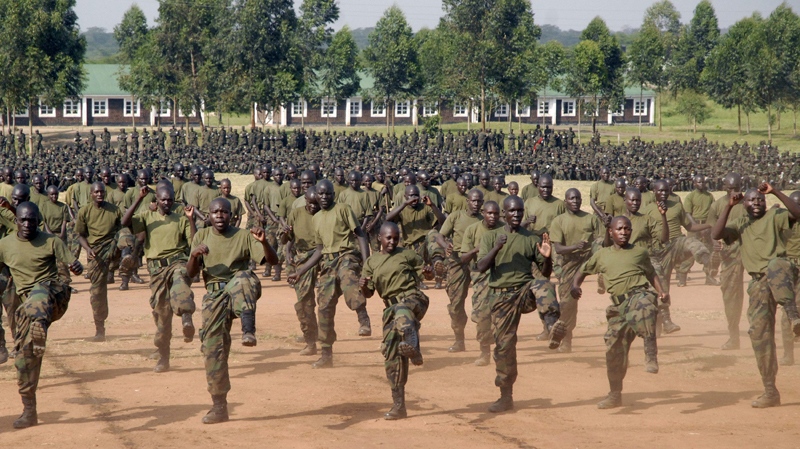 Some of the 1,800 Uganda Peoples Defence Force (UPDF) soldiers being sent to the African Union peace keeping mission in Somalia display kick box skills at Singo Military training camp about 100 km north of Uganda capital Kampala, Tuesday, Dec. 21, 2010. Commander Land Forces UPDF Gen. Katumba Wamala said the U.S. has upgraded the camp with training facilities, constructed dining hall and sleeping tents worth US$1.8 million. (AP / Stephen Wandera)