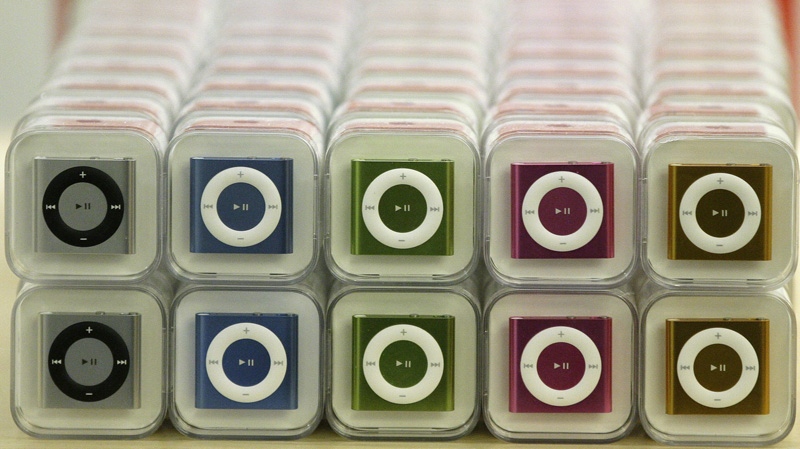 A group of iPod Shuffles are displayed at an Apple Store in San Francisco, Friday, Nov. 26, 2010. (AP Photo / Jeff Chiu)