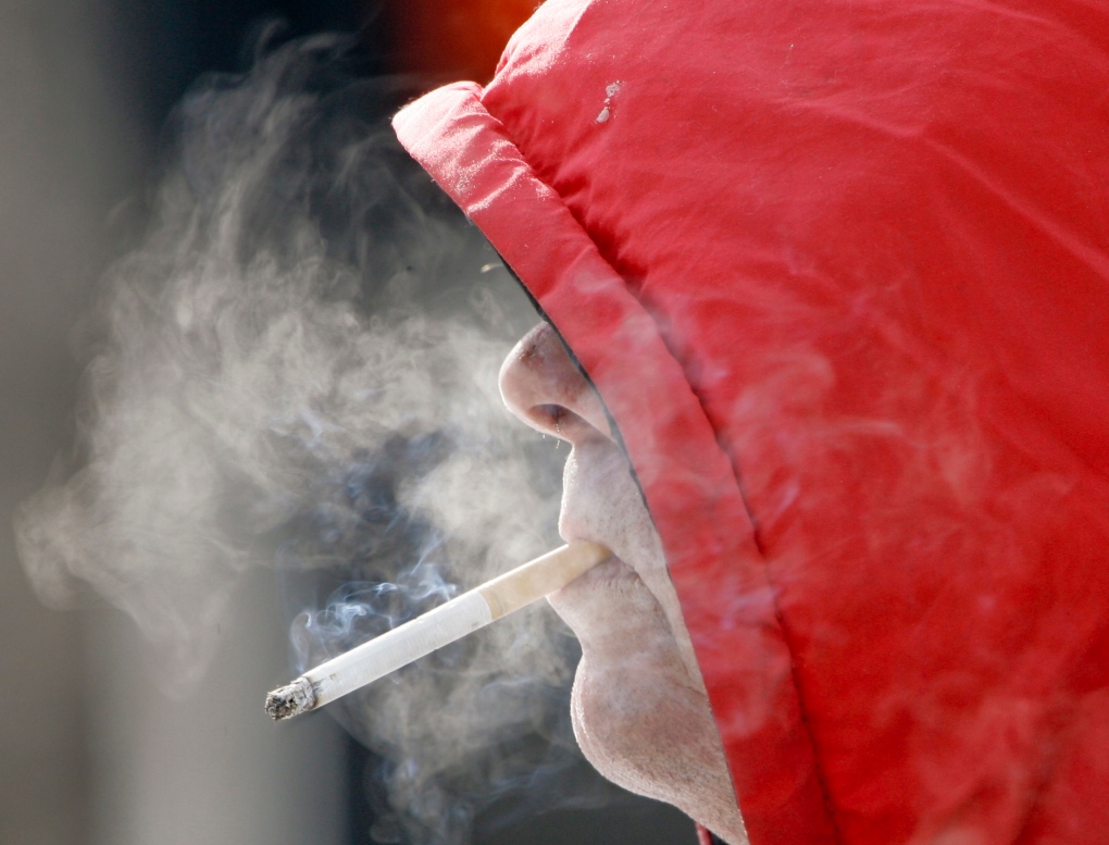 Experts debate penalities for smokers, obese 