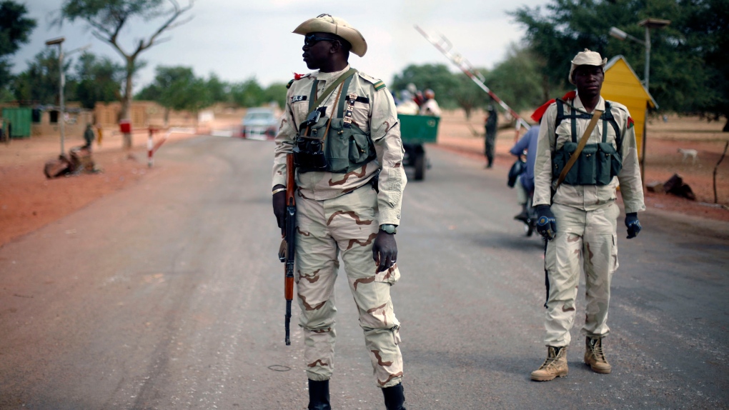 Malian soldiers man checkpoint