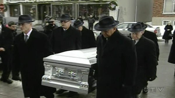 Pallbearers bring the casket holding the body of 10-year-old Deyan Perisic into the church Thursday.