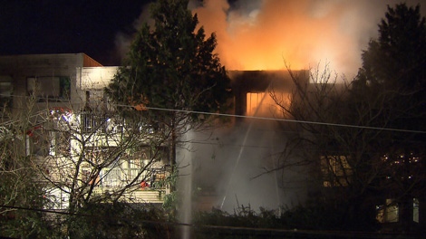 Three people were rescued during an apartment blaze in East Vancouver on Dec. 30, 2010. (CTV)