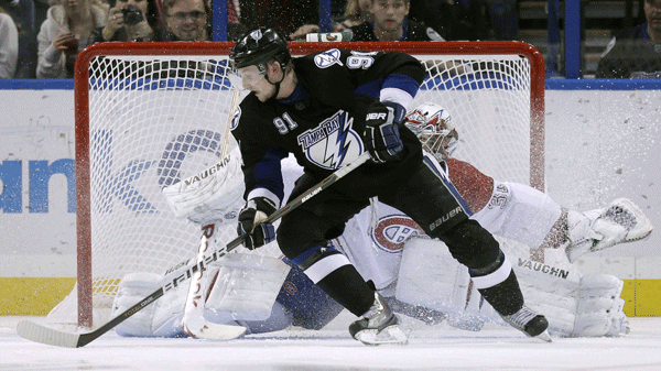 Tampa Bay Lightning's Steven Stamkos (91) beats Montreal Canadiens goalie Carey Price (31) on a penalty shot during the third period of an NHL hockey game Tuesday, Dec. 30, 2010, in Tampa, Fla. The Lightning won 4-1. (AP Photo/Chris O'Meara)