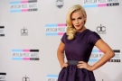 Jenny McCarthy arrives at the 39th Annual American Music Awards on Sunday, Nov. 20, 2011 in Los Angeles. (AP Photo/Chris Pizzello)