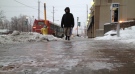Freezing rain warning ends, leaves icy sidewalks.