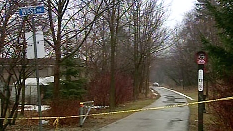 Police investigate after a 60-year-old man was stabbed to death while walking on the Iron Horse Trail in Kitchener, Friday, Dec. 31, 2010.