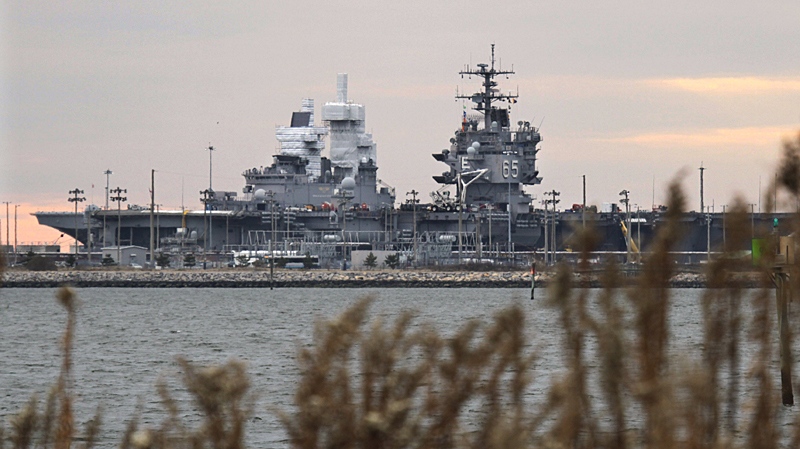 The nuclear powered aircraft carrier USS Enterprise sits pier side at the Naval Station Norfolk in Norfolk, Va., Tuesday, Jan. 4, 2011. (AP / Steve Helber)