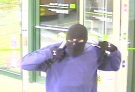 A surveillance photo released by OPP of a suspect wanted for robbing the TD Bank at 11846 Tecumseh Rd on Thursday, Jan. 31, 2013.