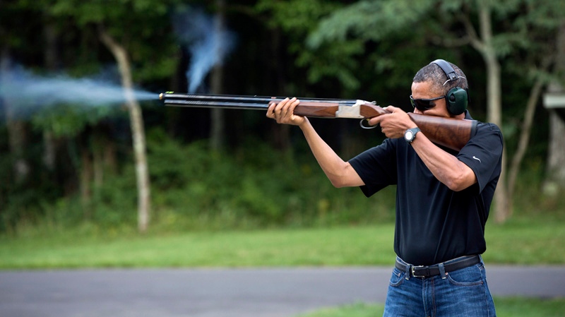White House releases photo of Obama firing gun