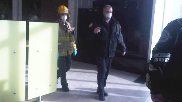 A CTV News viewer sent in this image of emergency responders wearing masks after a robbery at the Conestoga Mall in Waterloo, Wednesday, Jan. 5, 2011.