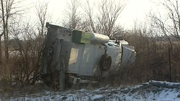 A two-vehicle collision closed an intersection at Snake Island and Doyle Roads in rural south Ottawa, Wednesday, Jan. 5, 2011.