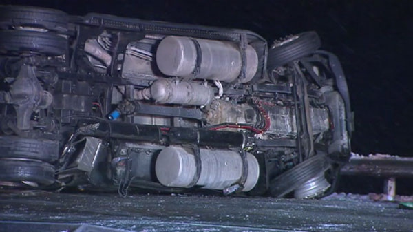 A truck rollover on Highway 400, shut down all lanes of the highway north of Toronto, Wednesday, Jan. 5, 2011.
